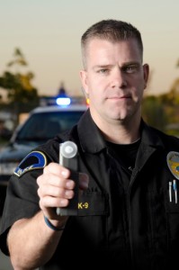 Cop with a breath test machine